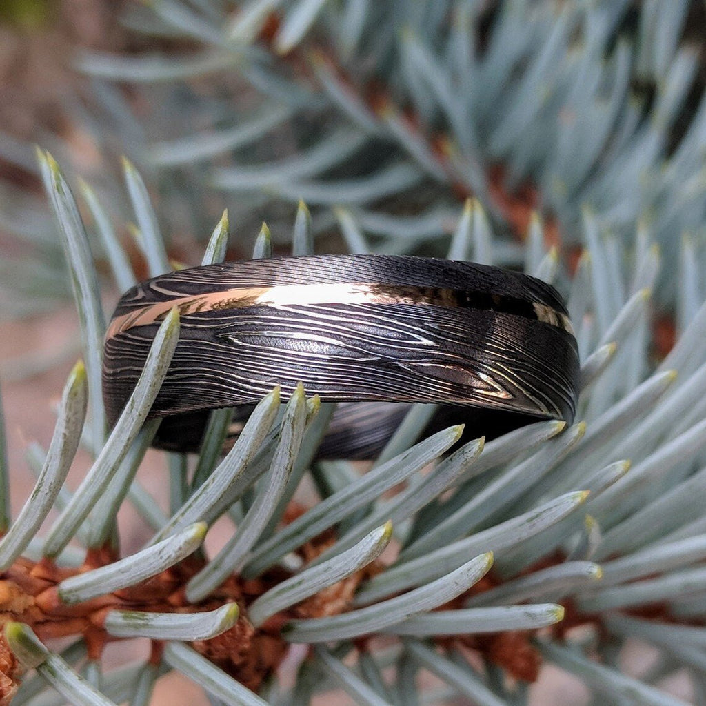 Damascus Steel Wedding Band with 14k Rose Gold Inlay