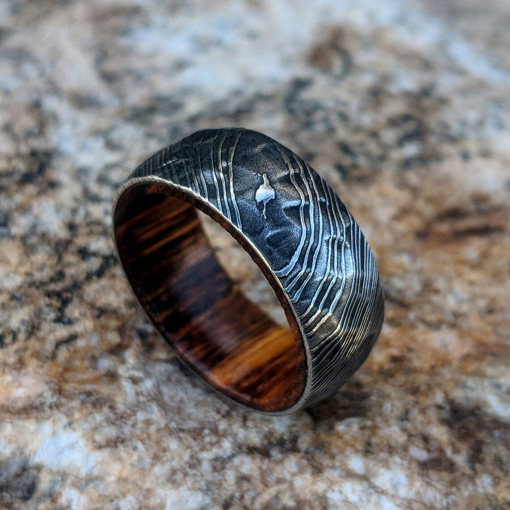 Damascus Steel Mens Wedding Band With Hammered Ironwood Sleeve