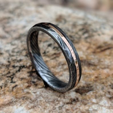 His and Her Damascus Wedding Band Set with 14k Rose Gold Inlay and Hammered Finish