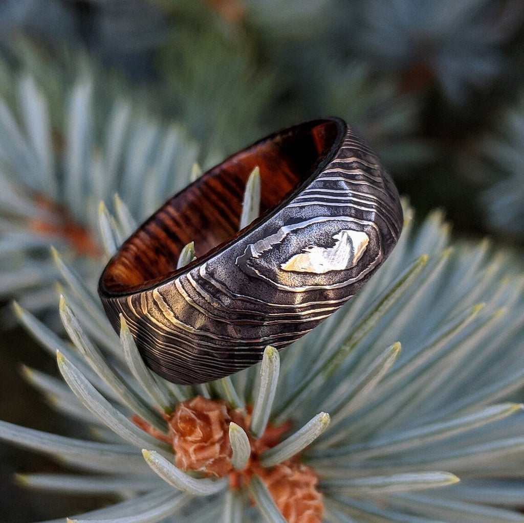 Damascus Steel Mens Wedding Band With Hammered Ironwood Sleeve