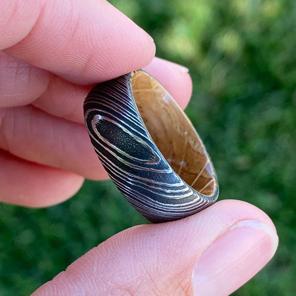 8mm Wide Damascus Steel Ring with a Whiskey Barrel Sleeve Handmade Wedding Band