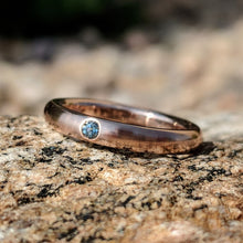 14k Rose Gold Wedding Ring with a 2.5mm Aquamarine Flush Set