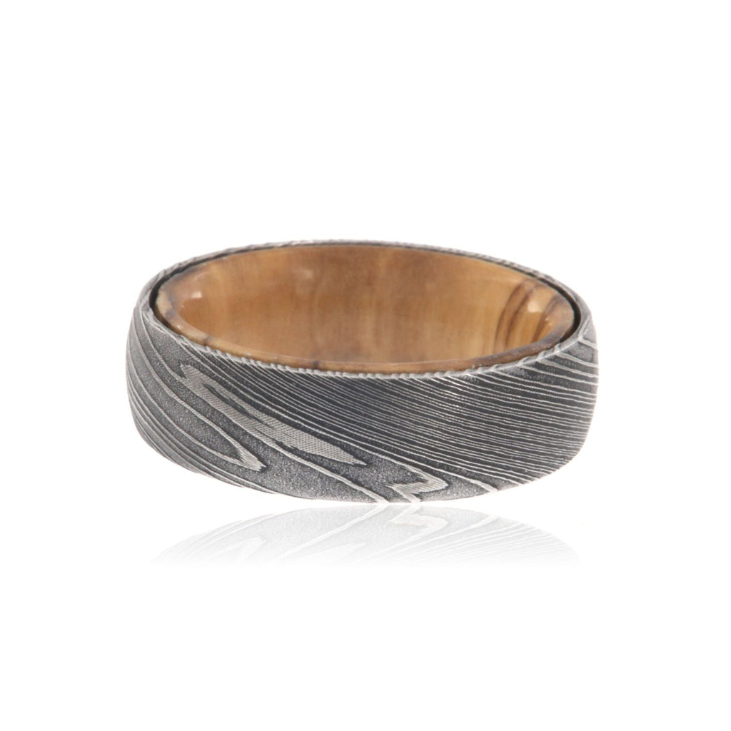 Damascus Steel Ring with Bethlehem Olive Wood Sleeve Damascus Bands