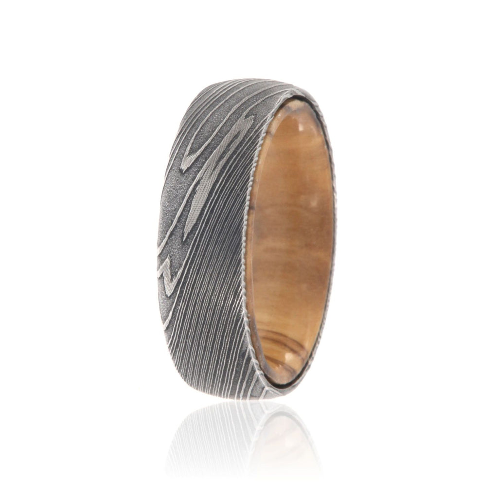 Damascus Steel Ring with Bethlehem Olive Wood Sleeve Damascus Bands